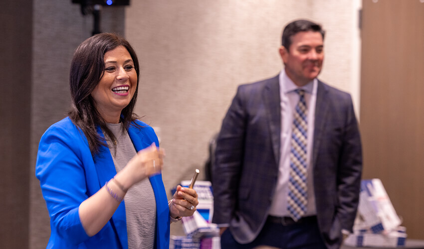Jessica Djabrayan Hannigan and John Hannigan presenting at a workshop