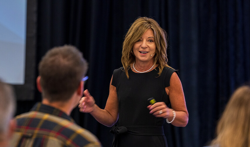 Janel Keating presenting at an event