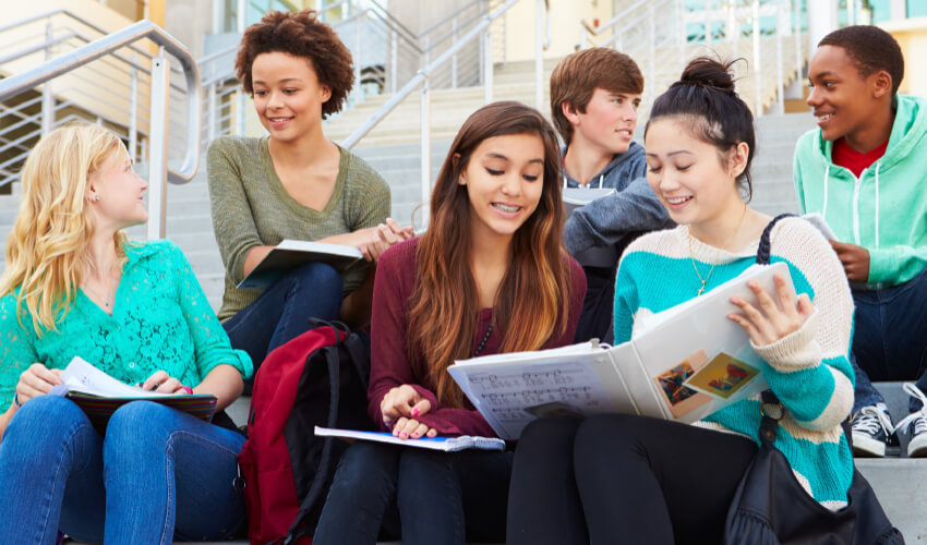Student working together outside of school