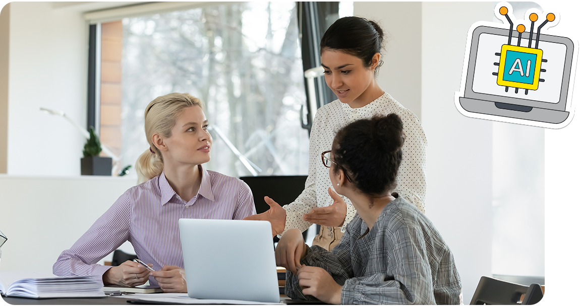Group of teachers using a laptop